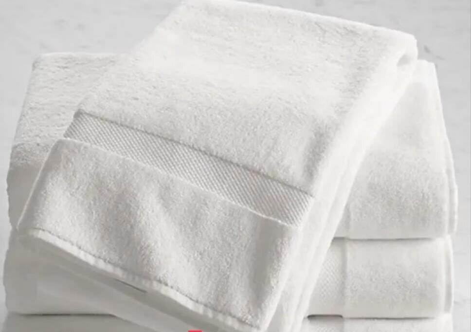 Serviettes de bain en coton blanc