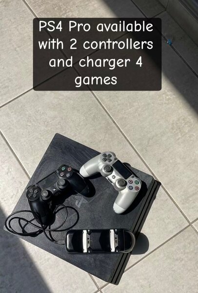 PS4 Pro available with 2 controllers and charger 4 games