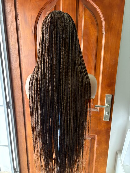 Perruque tressée longue