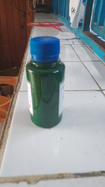 Flacon de colorant vert ci