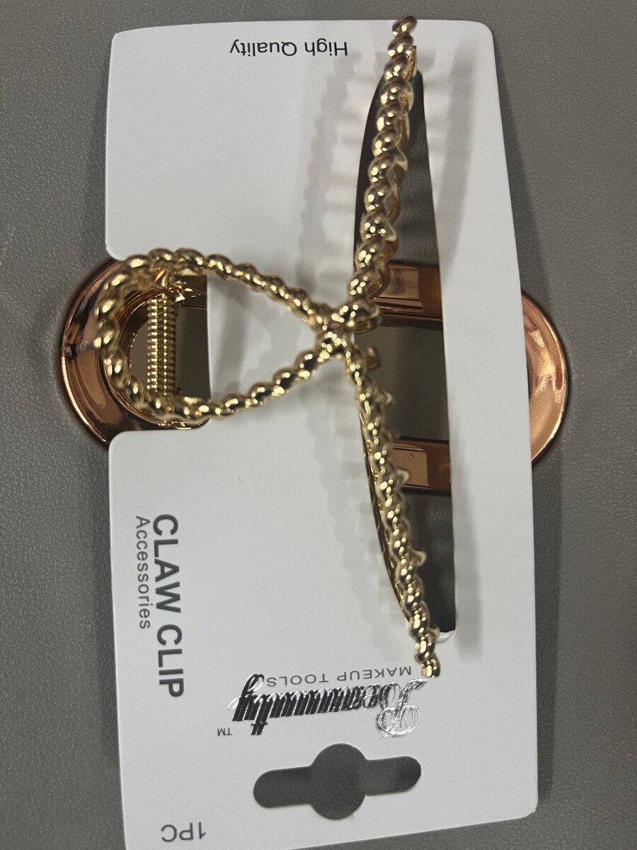 Pinces à cheveux dorée élégante