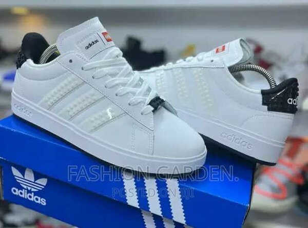 Baskets blanches unisexes Adidas