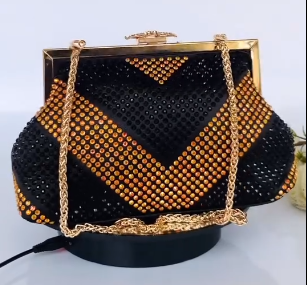 Delicate black clutch