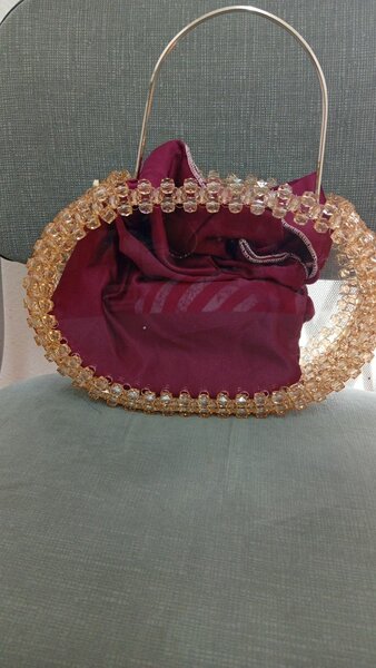 Sac à main perlé élégant