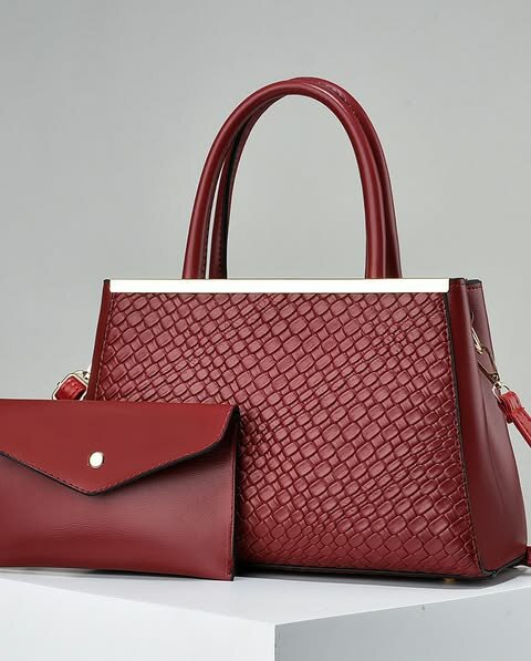 High-quality, stylish women's red bag with an accessory
