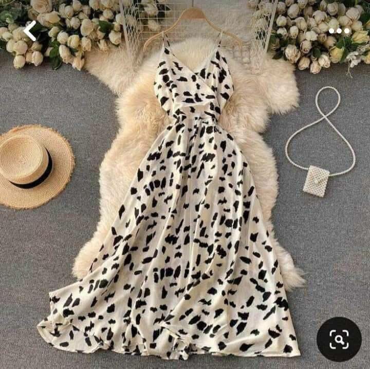 White dress with straps and black print