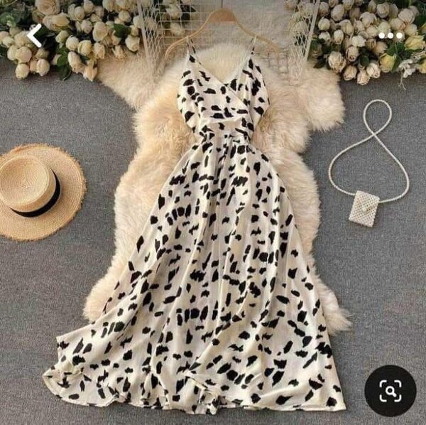 White dress with straps and black print