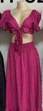 Beautiful and stylish women's dress with open belly in speckles