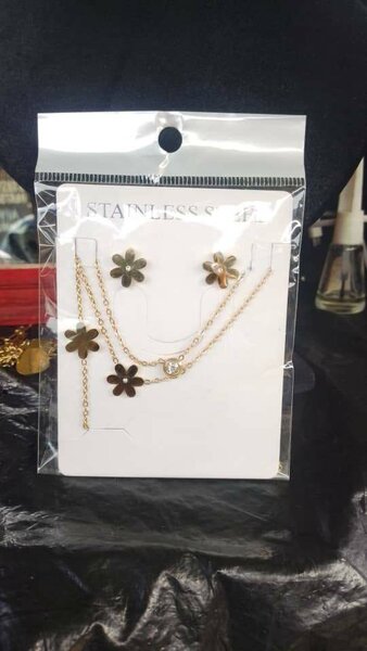 Ensemble collier et boucles d'oreilles fleurs en acier inoxydable