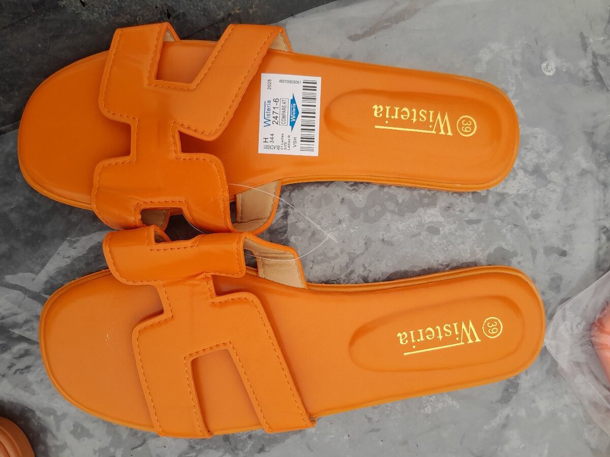 Sandales plates en cuir orange Wisteria