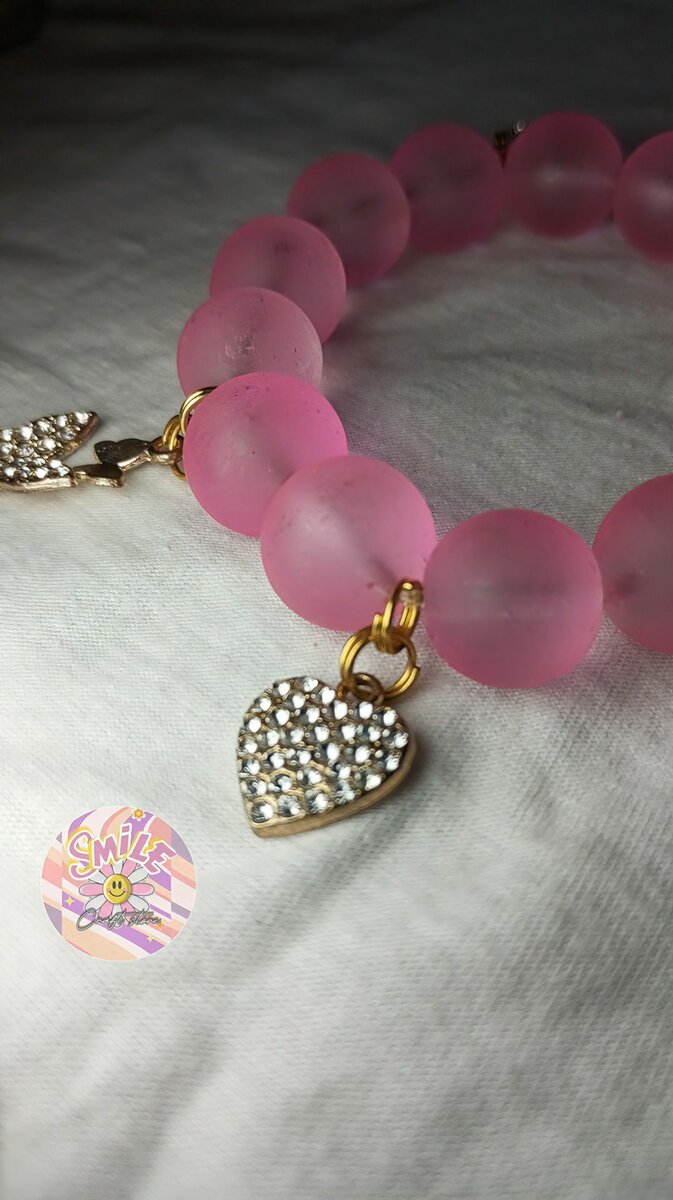 Pink charmed bracelet