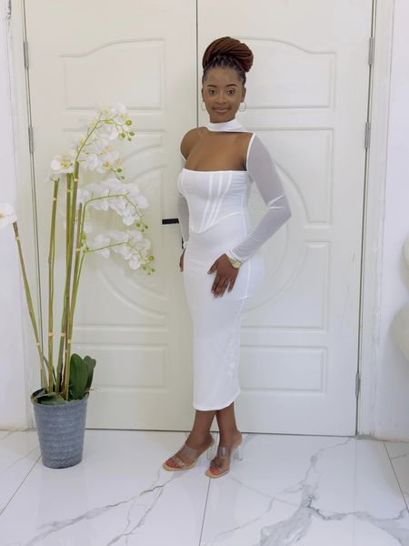 white long dress with corset and large neckline