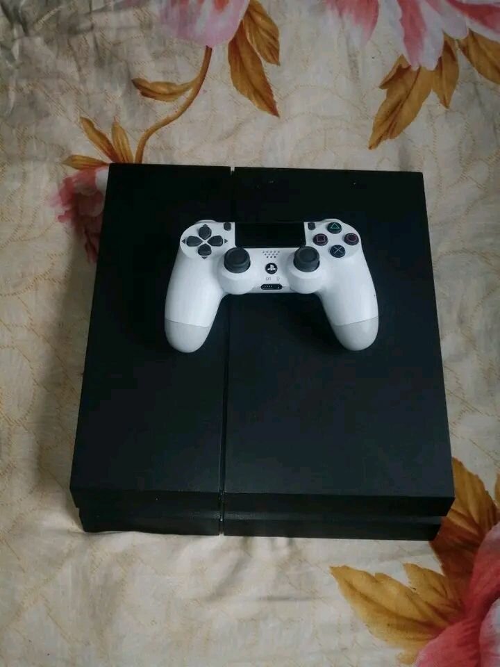 Console de jeu PS3 avec manette