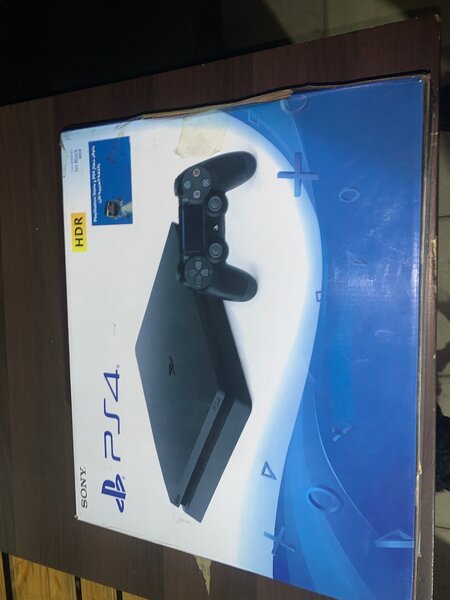 PS4 slim new in box with controller