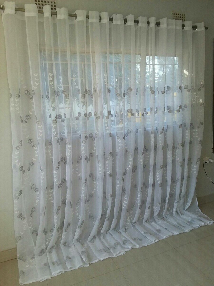 2 drops of curtains white with leaves patterns