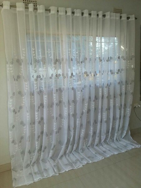2 drops of curtains white with leaves patterns