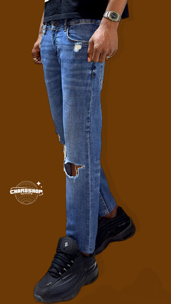 Jeans déchirés homme tendance