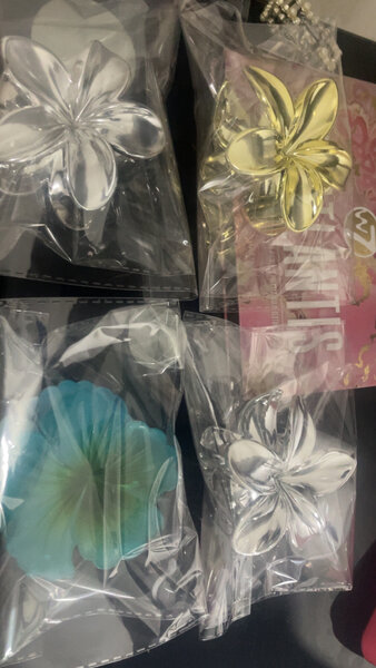 Pince à cheveux fleur brillante