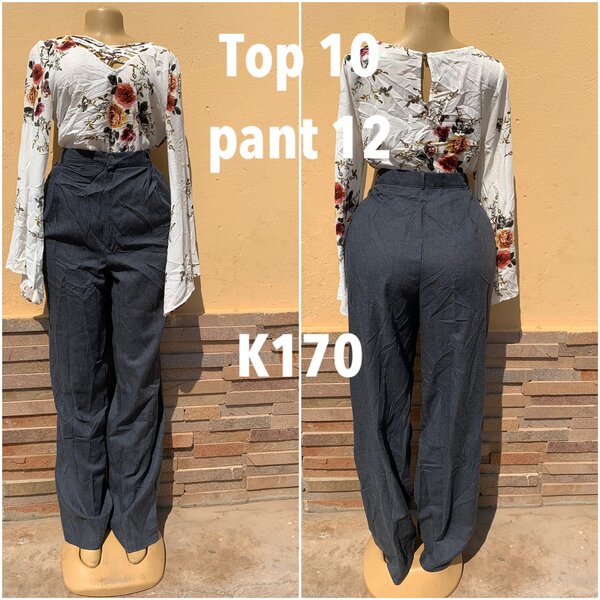 Set: white blouse with print, size 10, gray trousers, size 12