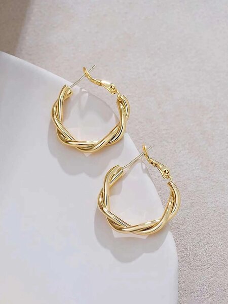 Boucles d'oreilles torsadées dorées
