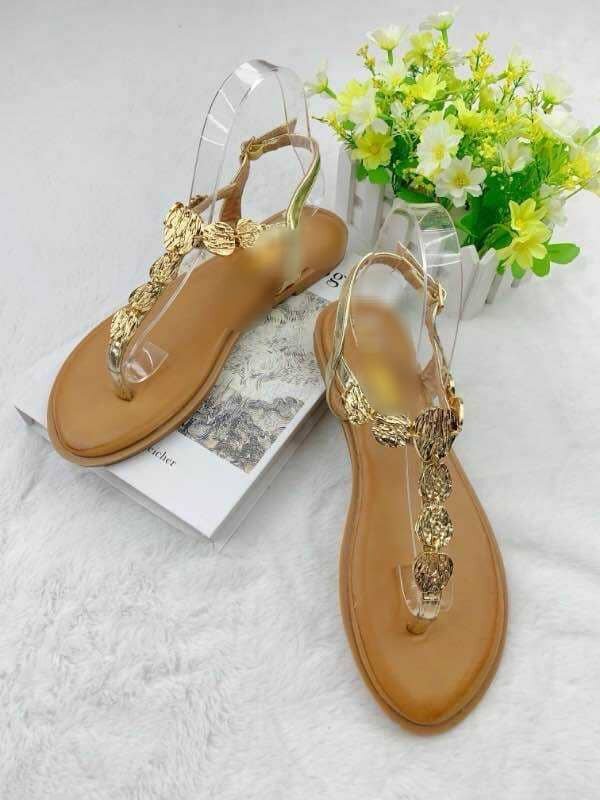 Sandales plates dorées élégantes