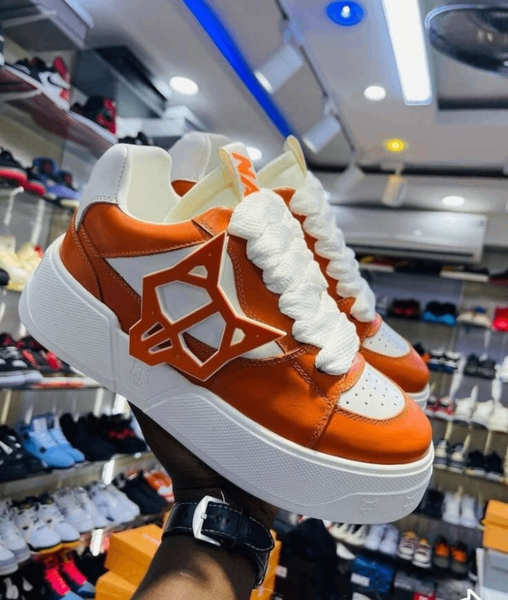 Chaussures de sport orange et blanc