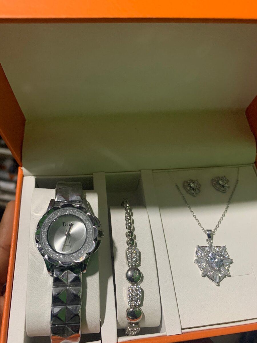 Ladies watch, bracelet, necklace and earrings
