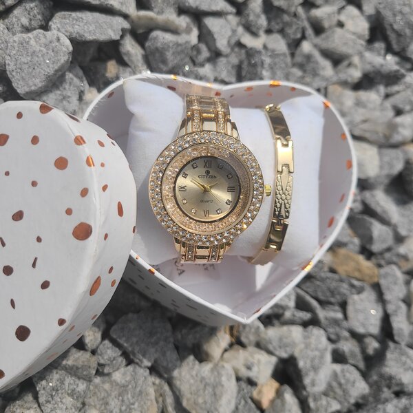 Gold watch with bracelet