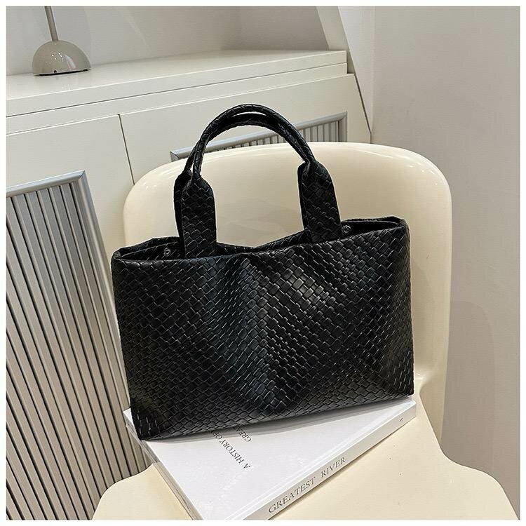 Sac à main tissé chic