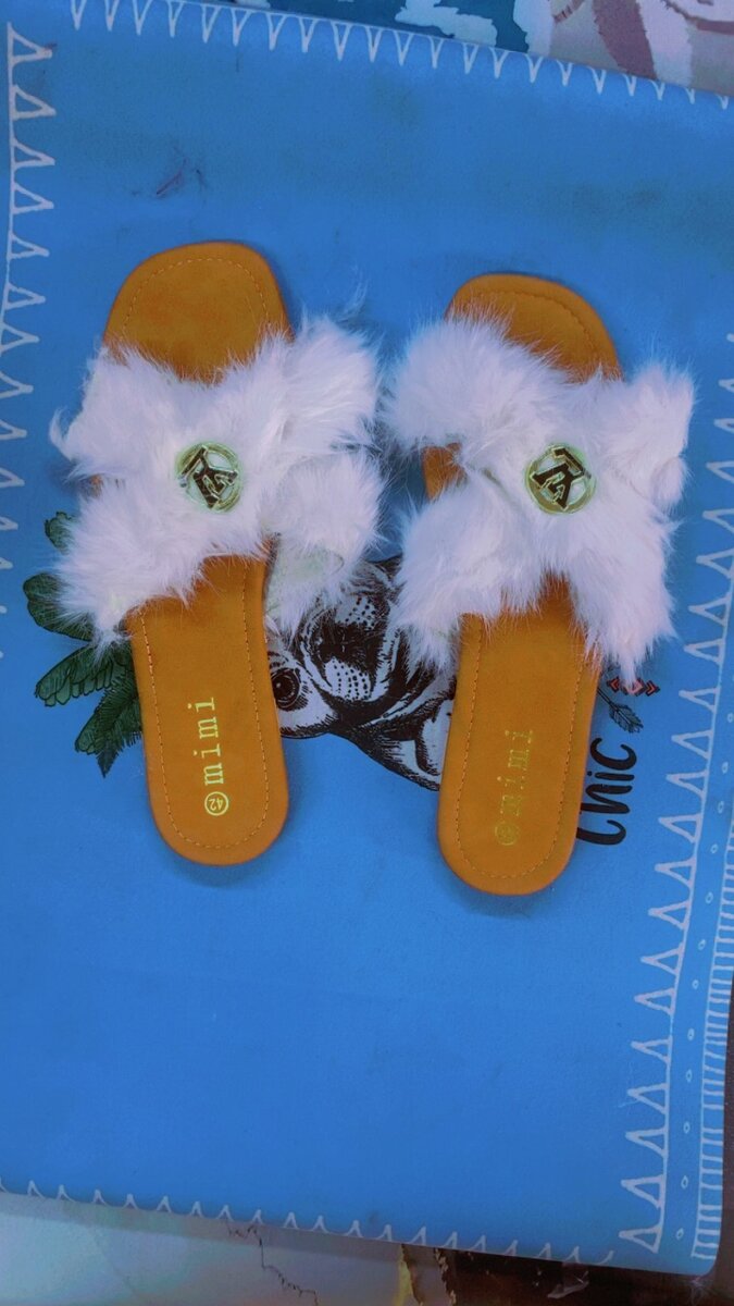 Claquettes en fourrure femme