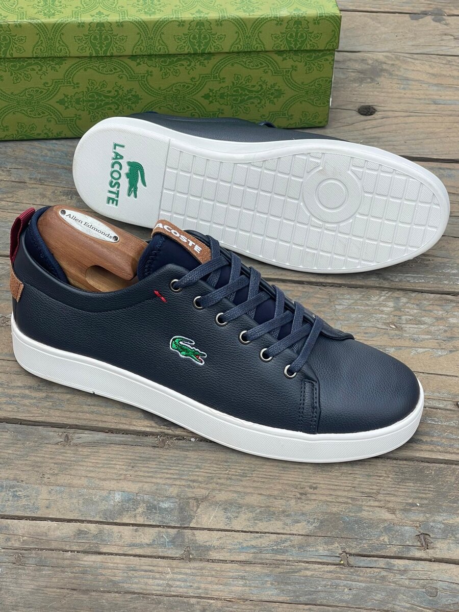 LACOSTE NAVY AND WHITE