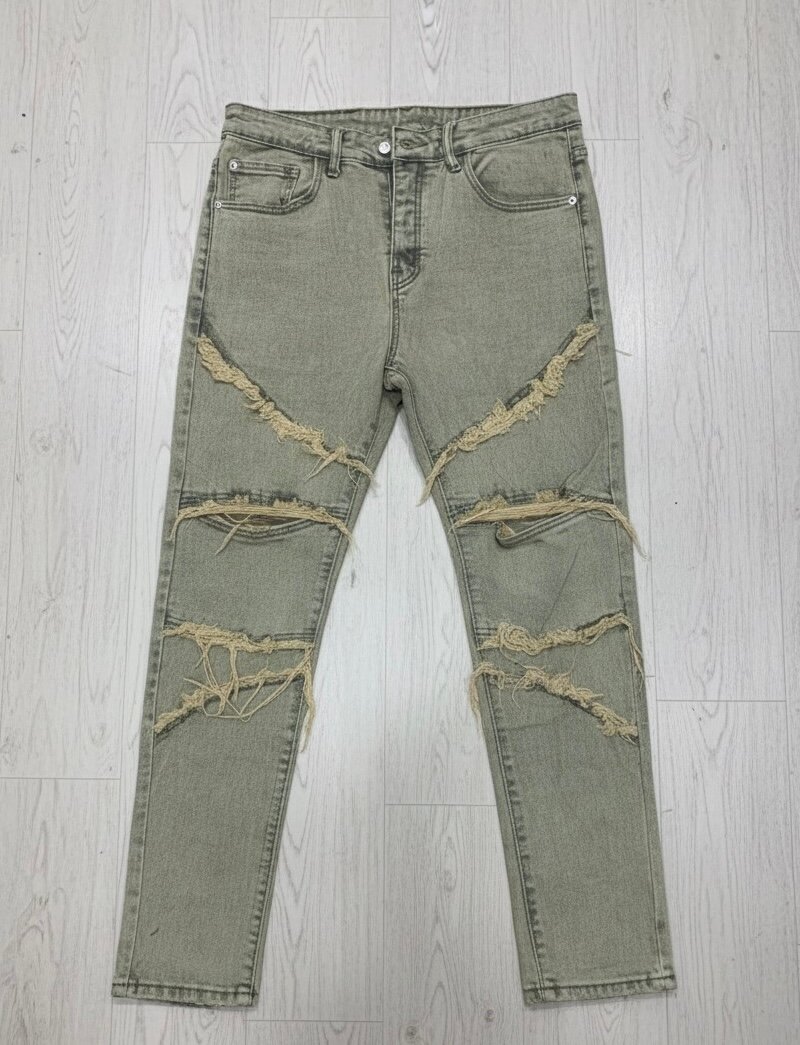 Jeans déchirés tendance