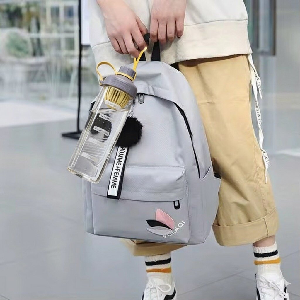 Sac à dos et bouteilles tendance