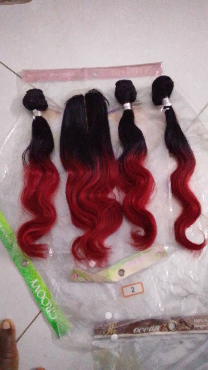 Extensions cheveux ondulés rouges