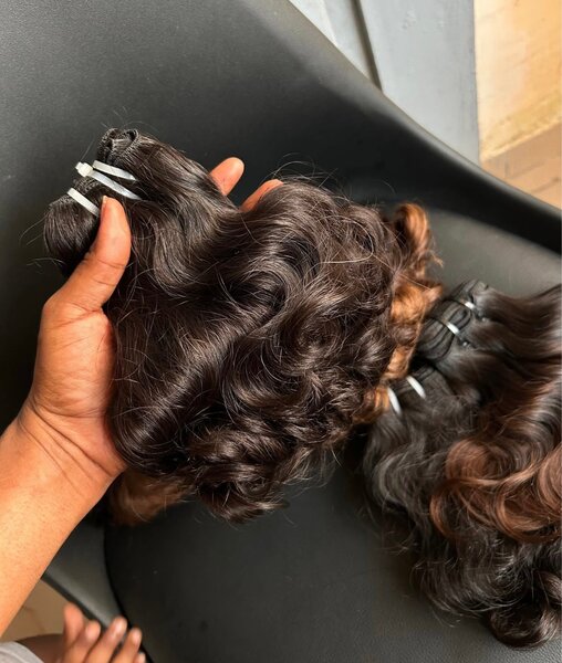 Extensions cheveux bouclés