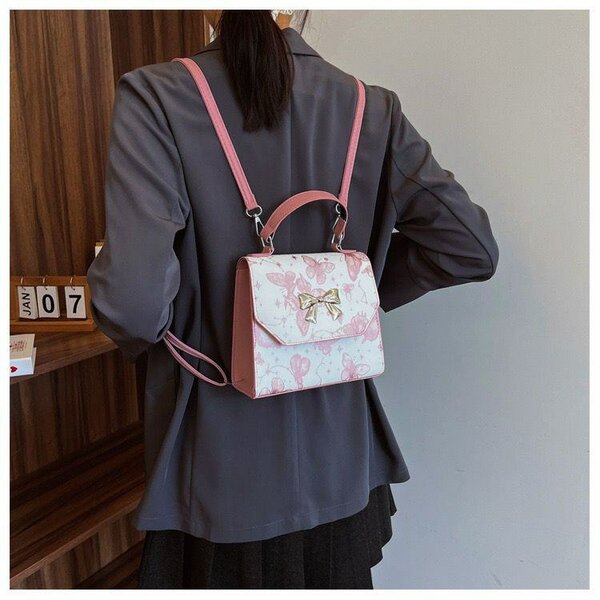 Sac à main élégant papillon