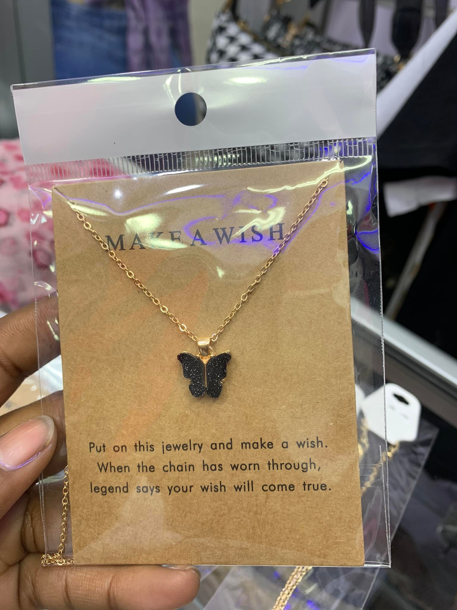 Pendant with black butterfly