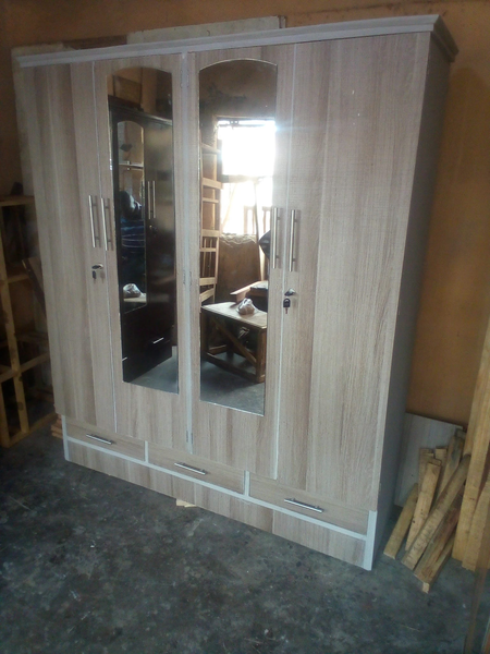 light brown cabinet with two mirrors