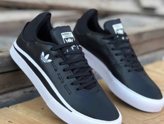 Boxed Adidas sneakers black