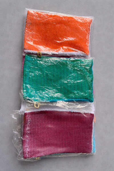 Gants exfoliants colorés