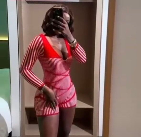 Combinaison moulante rayée femme