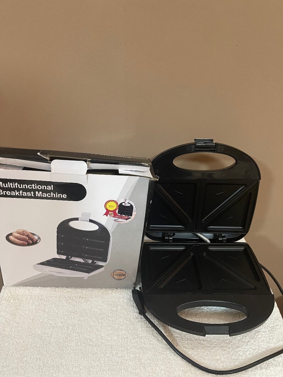 Bread toaster/sandwich maker