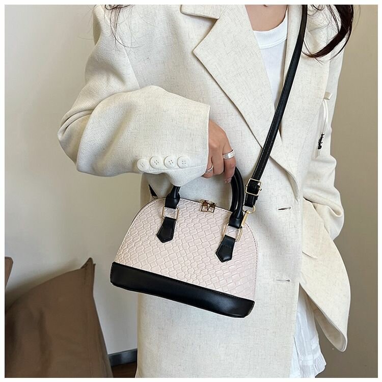 Sac à main élégant noir et beige