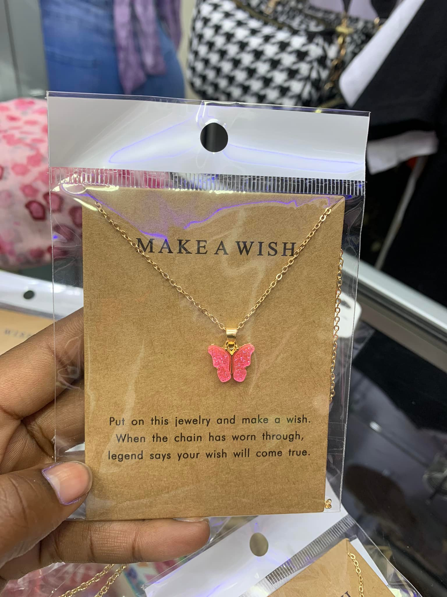 Pendant with pink butterfly