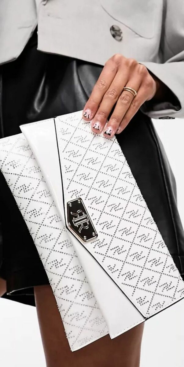 Clutch élégant blanc à motifs