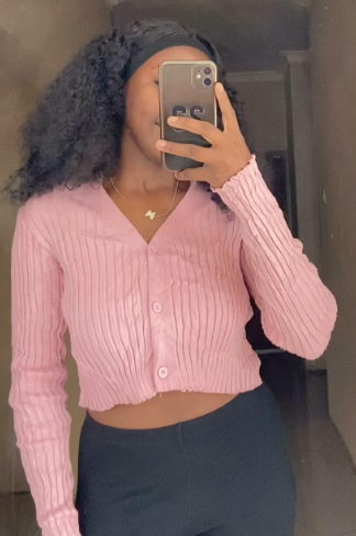 Short knitted Sweater with buttons in pink size: M