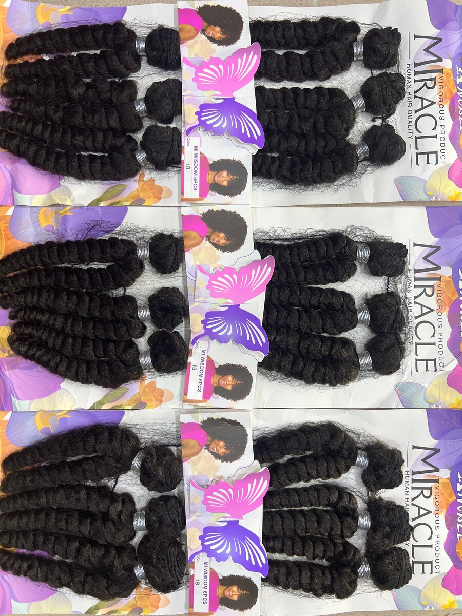 Extensions cheveux humains bouclés