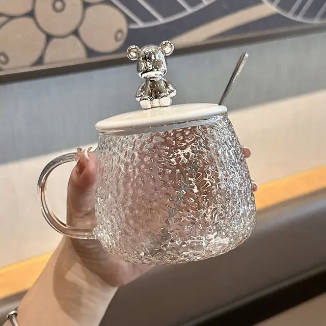 Glass mug with spoon