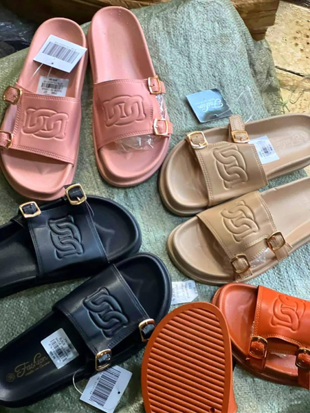 gold buckle flip flops