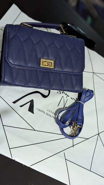 Dark blue quilted leather bag